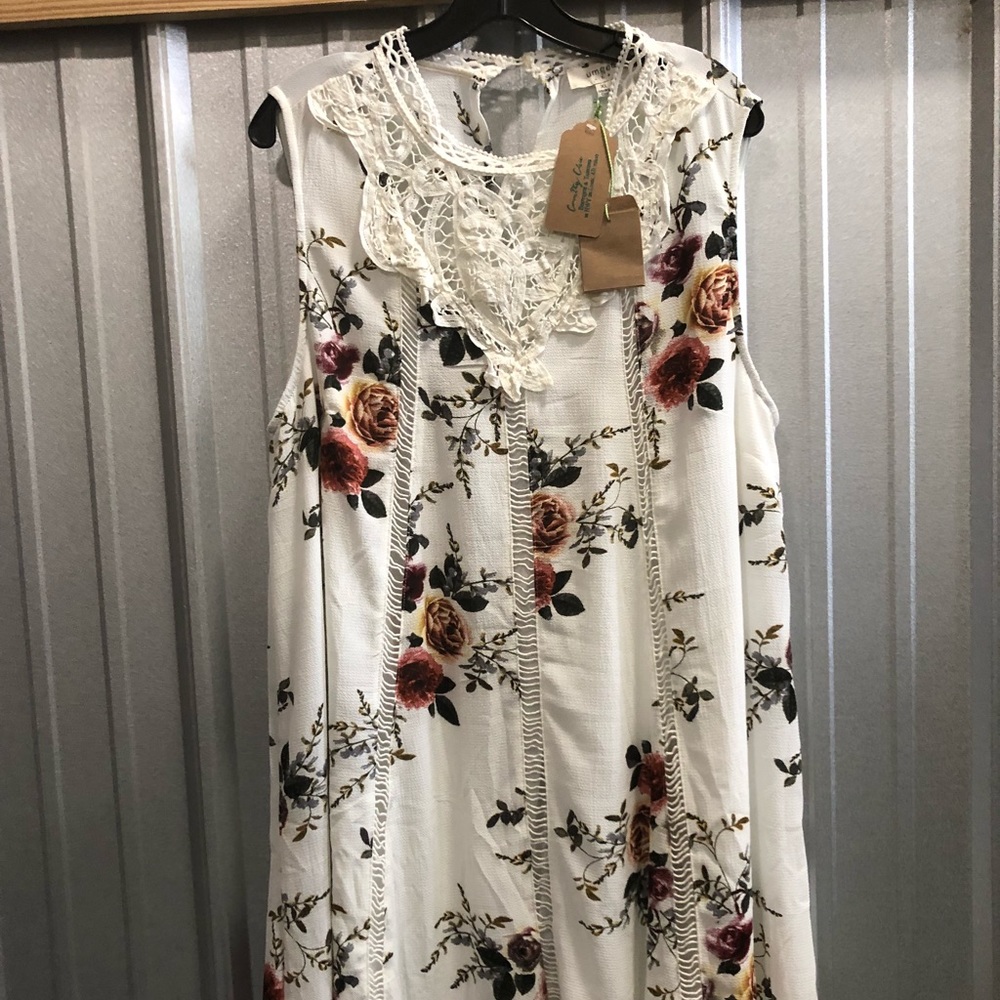 Floral print sleeveless dress with lace